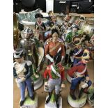 A collection of various porcelain soldiers of vari