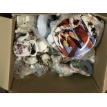 A box containing decorative ceramics collectors pl