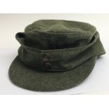 A WW2 German Army M42 Field/ski cap with early dou