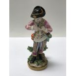 A 19th century continental porcelain figure. 17cm