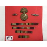 A military Royal Scots fusiliers hat badge, four m