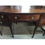 A Georgian mahogany sideboard fitted with four dra