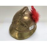 A French brass fireman’s helmet with badge for Sap