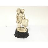 A late 19th century Japanese carved ivory figure g