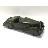 A rare green coloured Bakelite model car by Codeg,