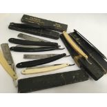 Ten straight razors, some in cases including Franc