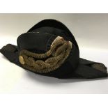 A 19 th century navy Bicorn ( cocked hat ) with a