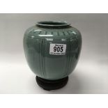 A Chinese celedon glazed Bulbous form vase with a