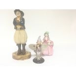An unusual French Quimper figure with signed base