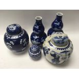 3 blue and white porcelain ginger together with a