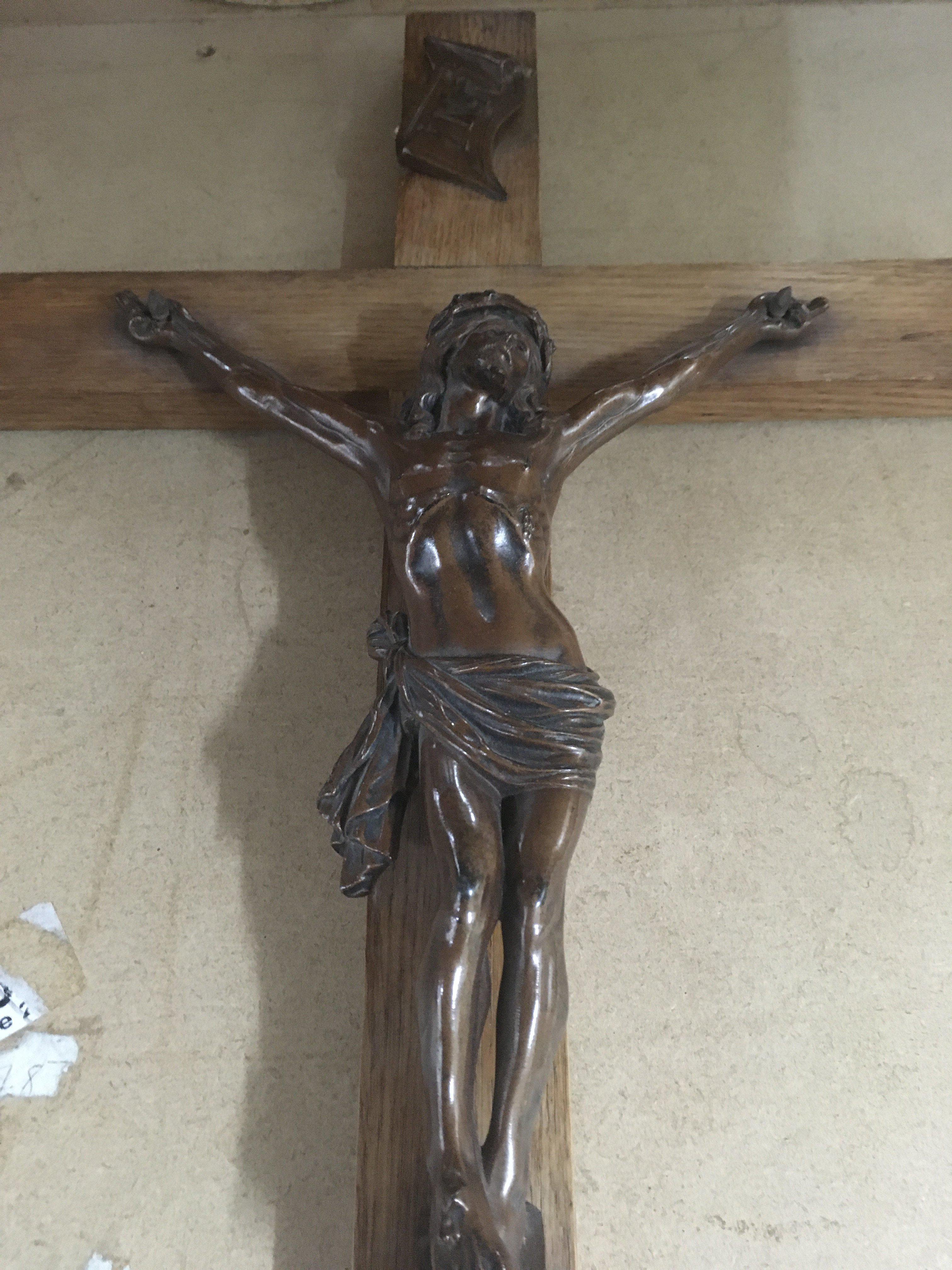 A spelter and oak crucifix.