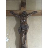 A spelter and oak crucifix.