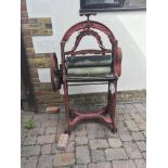 An old painted mangle. This is sold from the image