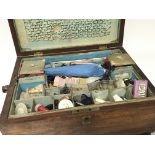 A Victorian mahogany sewing box containing bone an