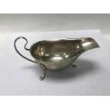 A 3 footed hallmarked silver gravy boat.