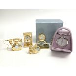 Five miniature decorative clocks including a Dulwi