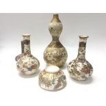 A small collection of Kutani pottery vases and one