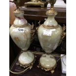 A pair of classical style onyx lamps and four othe