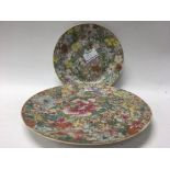 2 Chinese Famille rose decorated plates. 9cm/14cm.