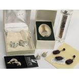 Various Swarovski Items including earrings in the
