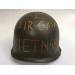 A Vietnam era M1 helmet found in Vietnam, with Pos
