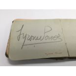 An autograph book, contains Tyrone Power amongst o