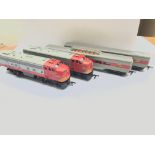 A Tri-ang '00' gauge electric loco 2 carriages and