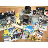 A collection of 1980s / 1990s Classic Lego sets including a castle Black Falcons Fortress - 6074,