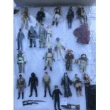 A collection of lose figures including Star Wars,