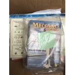A box containing Meccano magazines.