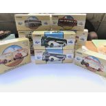 A collection of boxed Corgi Classic busses ect.(10