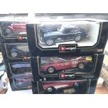 A collection of Burago boxed cars.(8)