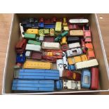 A collection of loose playworn diecast vehicles in