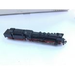 An Fleischmann n gauge locomotive and tender. Plus