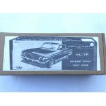 A boxed Tin plate Chevrolet Impala.
