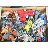 A collection of Transformer toys.