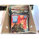 A box containing a collection of 200 ad comics