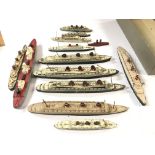 A collection of playworn ships etc.(2)