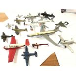 A collection playworn of diecast aeroplanes.