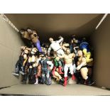 A collection of 35 wwe figures, some broken.