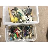 A collection of Star Wars figures and ships, including a Slave 1, Hoth wamper, Jabba the hut. Some