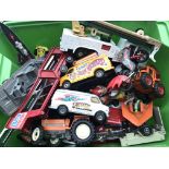 A collection of playworn diecast cars.