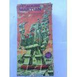 A boxed Attacking Martian robot Battery operated.