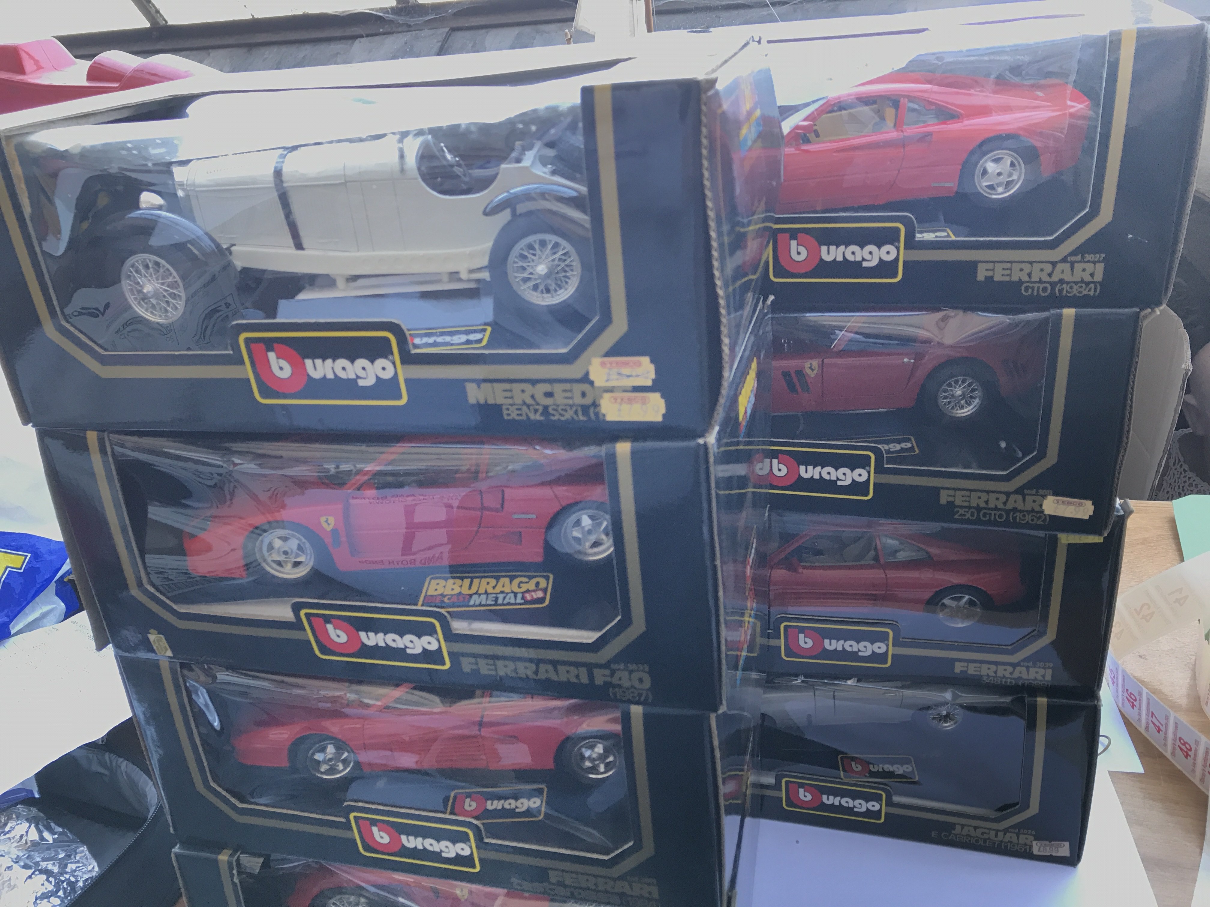 A collection of boxed Burago cars(8)