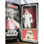 A boxed 12" stormtrooper figure.