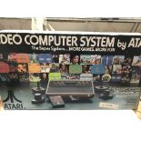 An Atari video games system boxed. Model number Cx