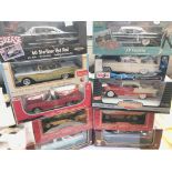 A collection of 1:18 scale cars, all boxed includi