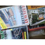 A box containing a collection of railway magazines