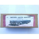 A boxed American Lincoln Tin Plate car.