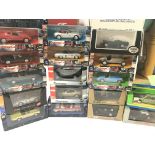 A collection of Die-cast cars.